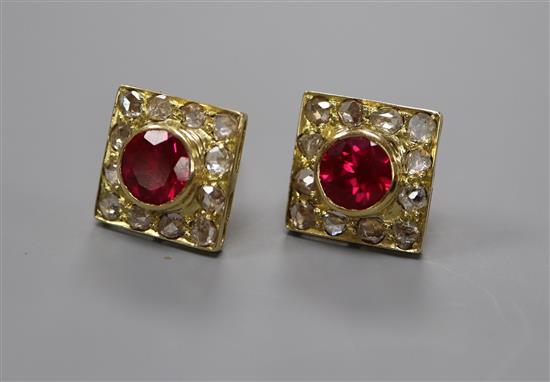 A pair of yellow metal, red stone and rose cut diamond set tablet ear studs.